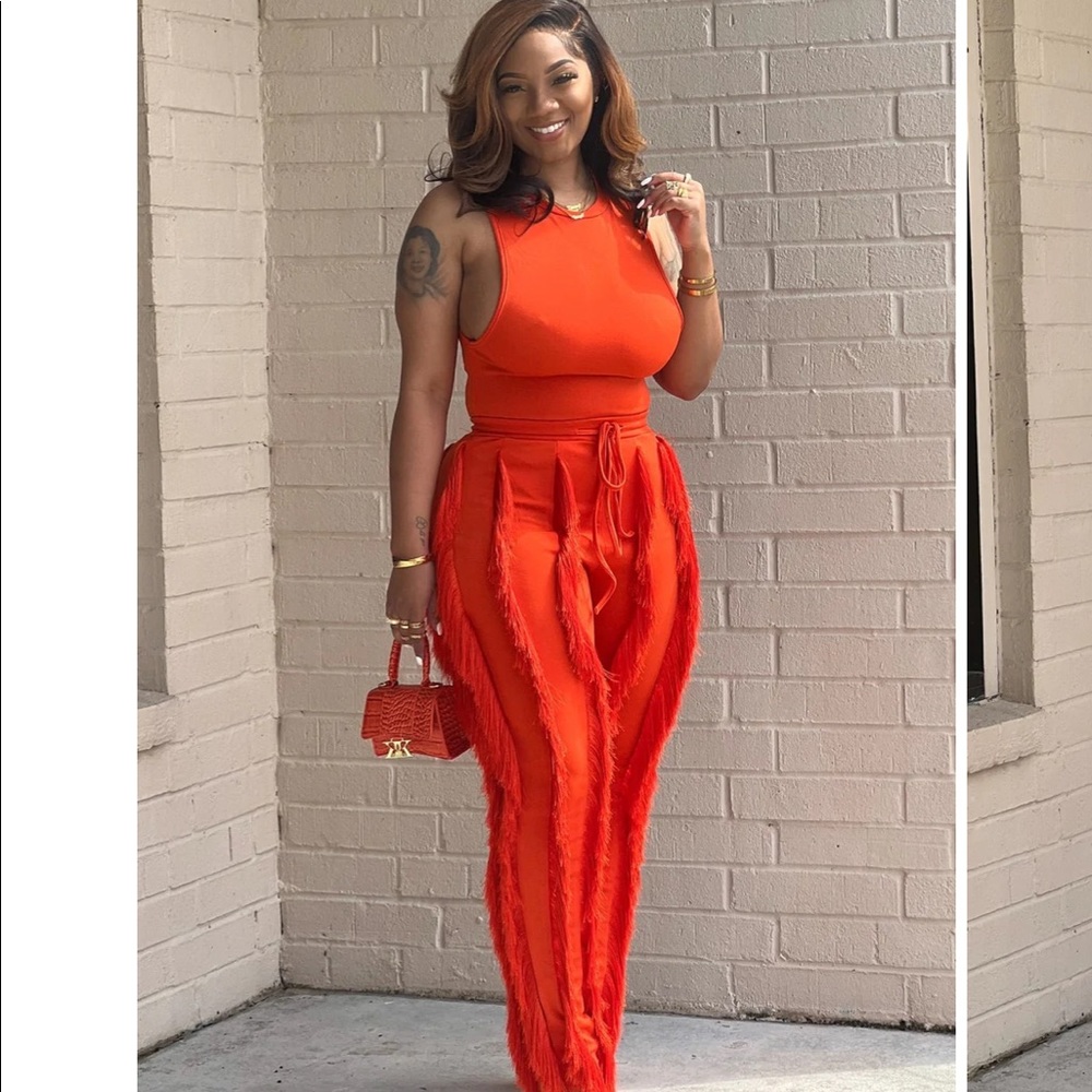 Beautiful red tassel trousers with matching red racer back bodysuit